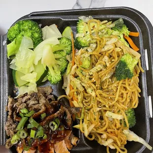 a meal of noodles, broccoli and meat