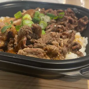 a plate of beef and rice