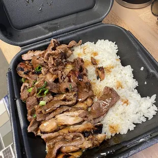 a meal in a styrofoam container