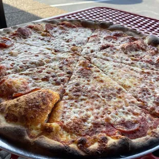 Mo'roni pizza with a few pepperonis.