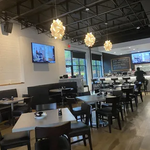 Clean &amp; trendy interior w fabulous patio. Hybrid sushi bar blended w sports bar vibe. Lots of TVs