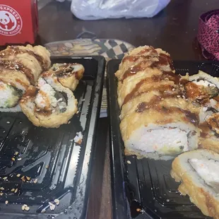 two trays of sushi