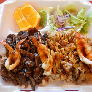 Yogi&apos;s Plate -- beef, chicken, and shrimp teriyaki over rice with salad and a sliced orange