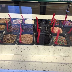 a variety of desserts in trays