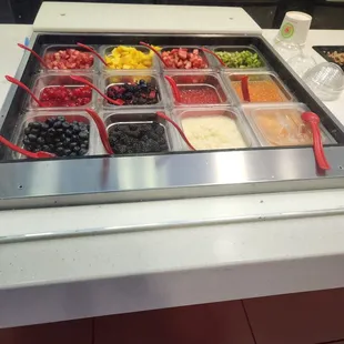 a variety of fruit in a display case