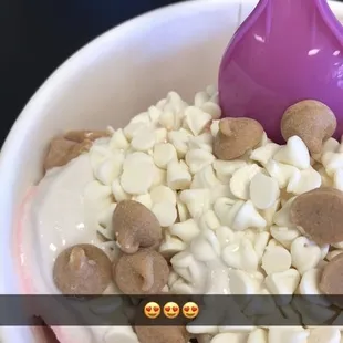 Strawberry Frozen yogurt, white yogurt chips, and peanut butter chips.
