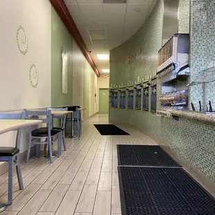 an empty restaurant with tables and chairs