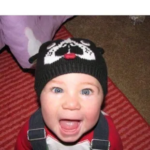 a baby wearing a hat