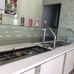 a counter with a variety of food items