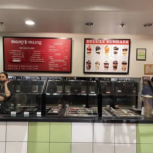 a woman behind the counter