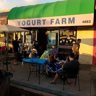 a group of people eating outside