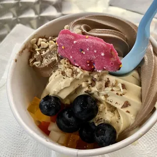 Mine pistachio, Mint Chocolate Chip Yogurt With Almonds, blueberries and animal cookie