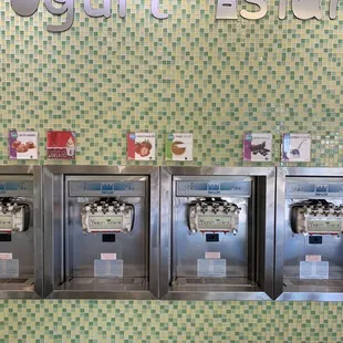 a row of ice cream machines