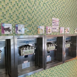 a row of ice cream machines