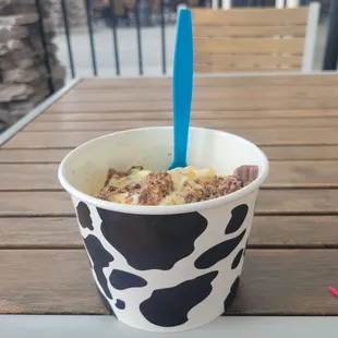 a cup of yogurt on a table