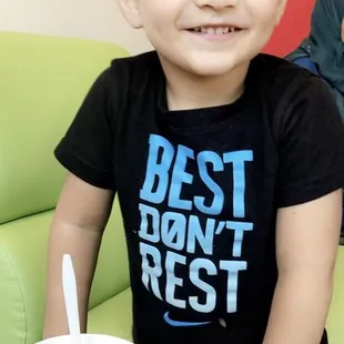 Isaac enjoying yogurt on this hot summer day