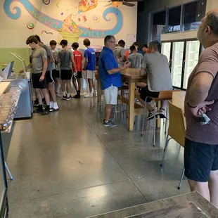 a group of people in a restaurant