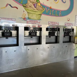 a row of ice cream machines