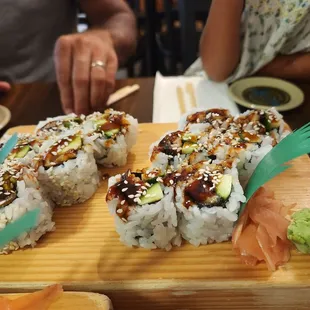 2 different unagi rolls - one with avo one with cucumber