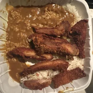 Halfway through eating the Curry Yaa Chicken Katsu!! It was amazingly good!!