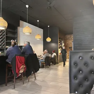 people sitting at the bar