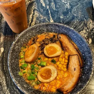 Spicy Tonkotsu ramen with extra egg and Thai Tea