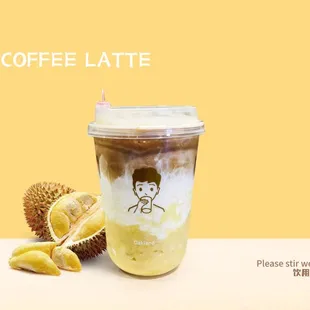 a cup of coffee and a piece of fruit