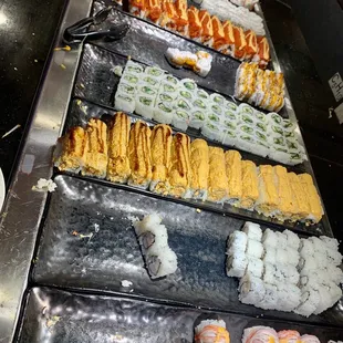 a variety of sushi rolls