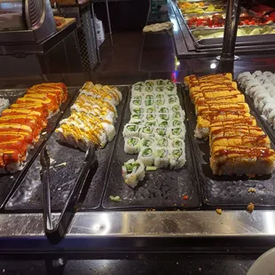 a variety of sushi rolls