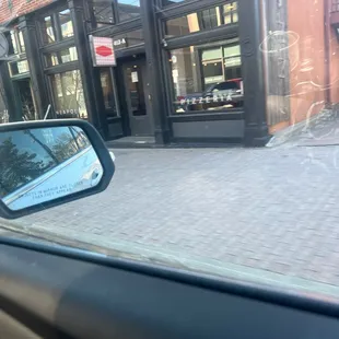 a view of a building through a car window