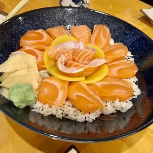 a plate of sushi on rice
