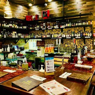 a bar with many bottles of wine