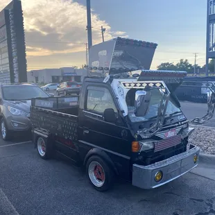 Fun themed car in front of Ramen Shop