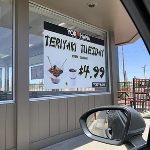 a sign in the window of a restaurant