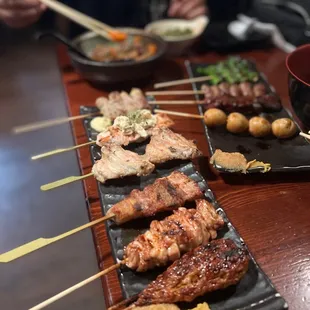 Omakase 6 Skewers.  Chicken meatball. Chicken gizzard. Pork belly. Chicken wing. Chicken thigh. Asparagus pork. - @rayz