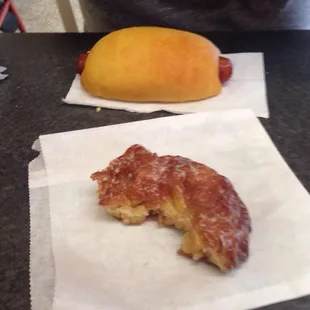 Sausage roll and half eaten apple fritter. There is nothing special about these, which is indicative of the whole place