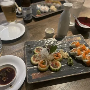 Spicy crawfish rolls and the giesha roll with a large sake.
