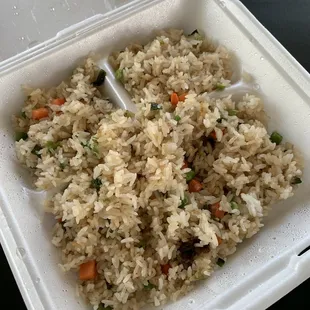 A $13.95 half full plate of fried rice. I was still hungry.