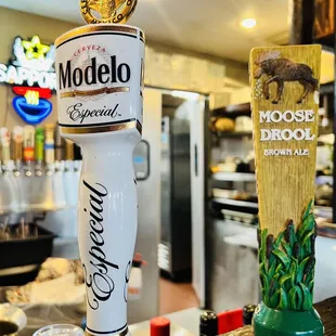 a modelo beer on a bar