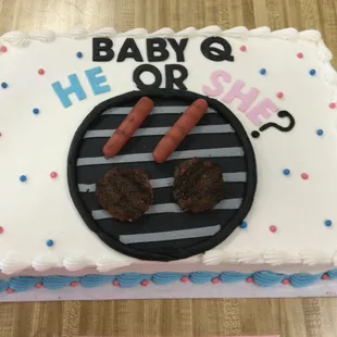 a cake with hot dogs on it
