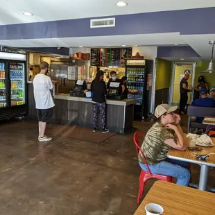 a group of people in a restaurant