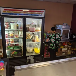 a woman standing at the counter