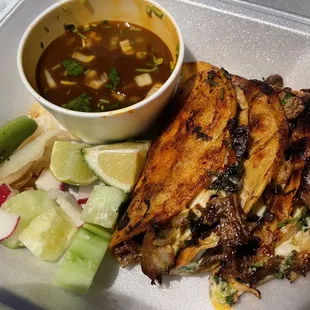 a plate of food and a bowl of soup