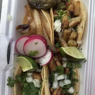 El Pastor and 2 Chicken Tacos Made to Order! Fast and Family style service