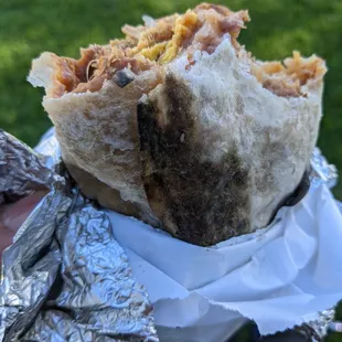 Dirty, old grease on my tortilla. Stopped eating after I noticed it.