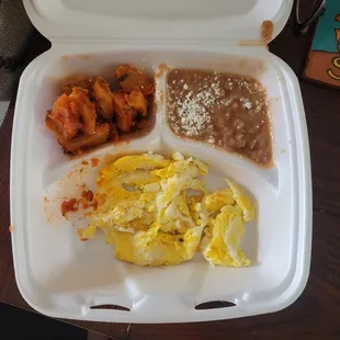 a meal in a styrofoam container