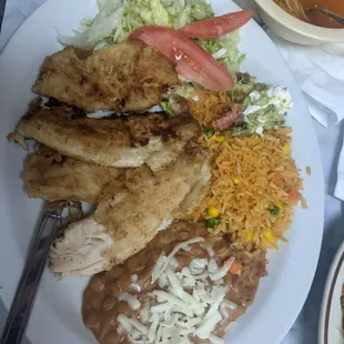 Fish fillet plate. Complete meal with all the fixings .