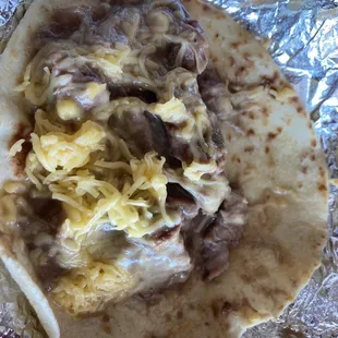 Carne guisada with cheese