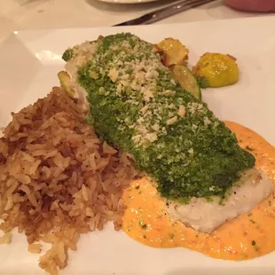 Pesto halibut with rice Pilaf and summer squash