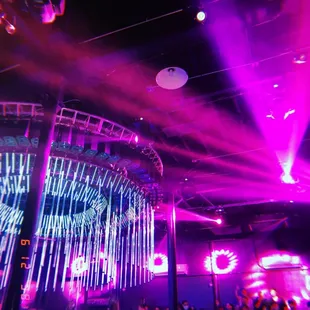 a disco scene with purple lights